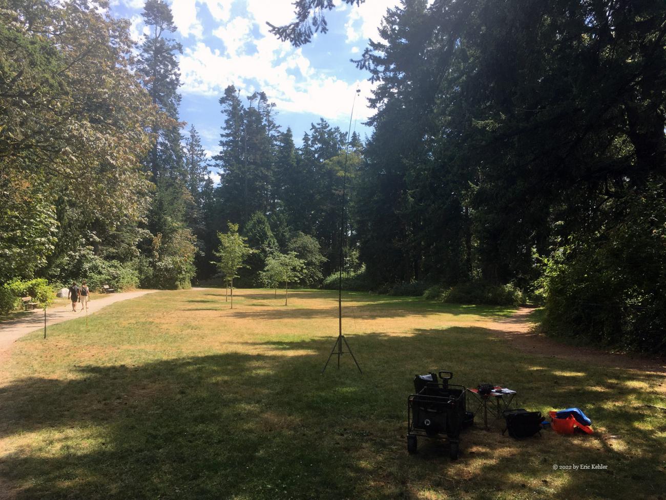 The first grassy area after the hall