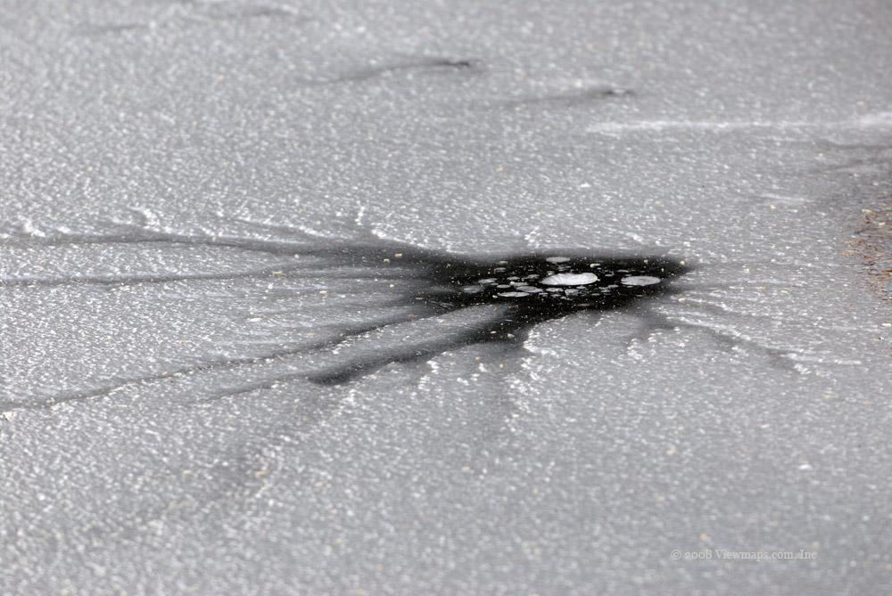 This frozen over hole looks quite other worldly.