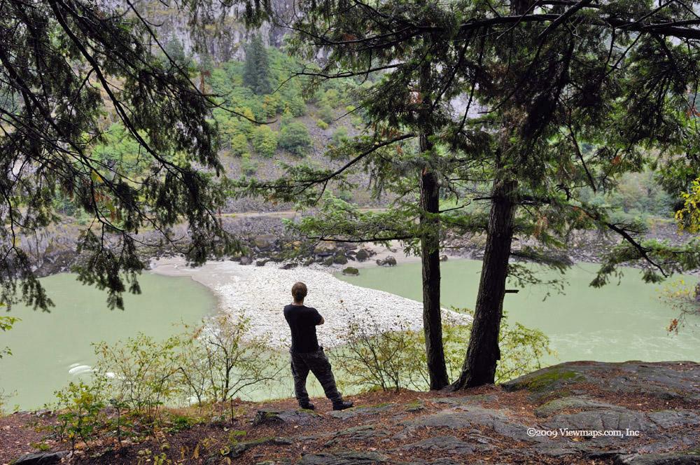 Geoff enjoying a view of the river as it passes a narrow stretch