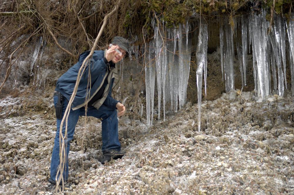 Geoff exploring an ice encrusted over-hang
