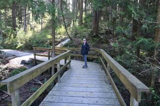Ralph on the small foot bridge that leads to the forest trail