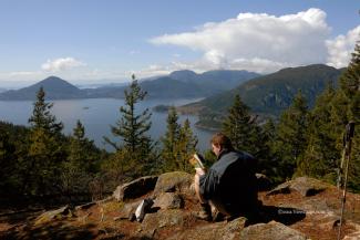 Ethan soaking in the rays with a great view and enjoyable book