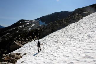 Geoff crossing a large snow field
