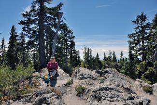Carolyn resting on the summit