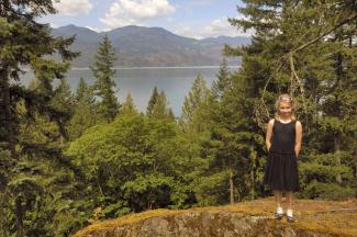 Elizabeth on the top of a large rock