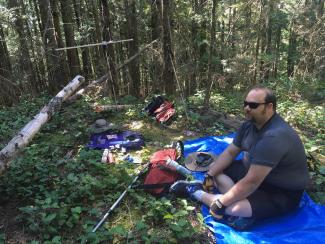 Nick on the summit with my radio gear set up 