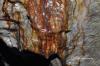 Slowly the minerals form colours and stalactites