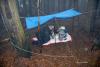 Brett under his tarp making a radio contact